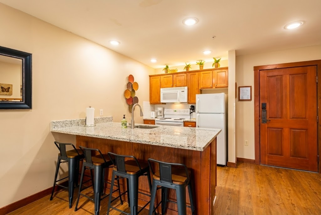 Our modern kitchen features a beautiful island with bar stools.