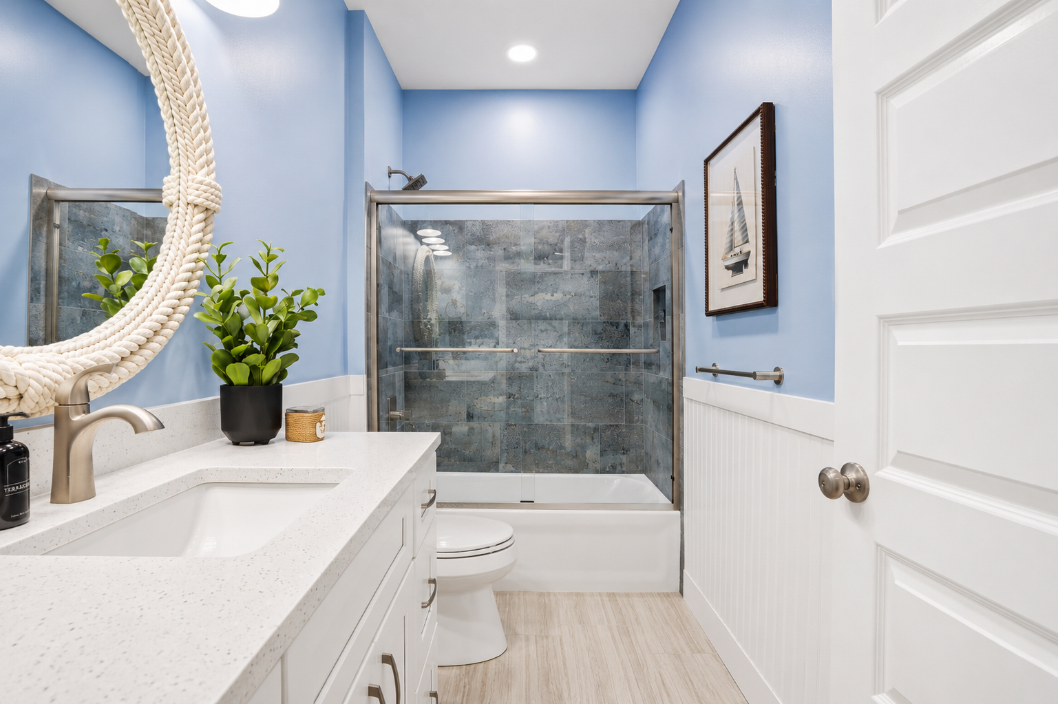 Freshen up in this bright and beautifully designed first-floor full bathroom, featuring a spacious tub and shower combination, modern finishes, and plenty of room to start or end your day in comfort.