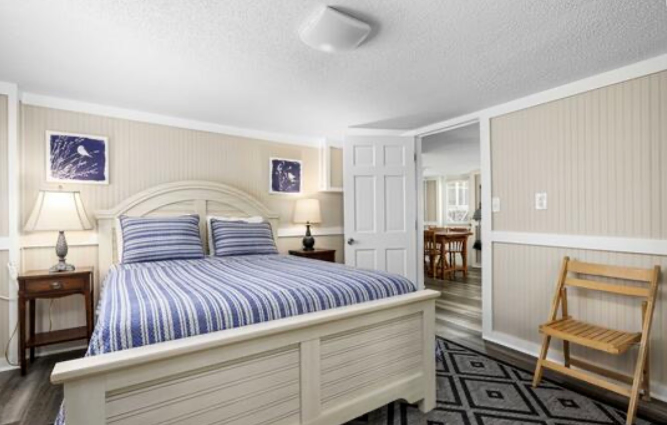 Drift off in a calm, coastal bedroom with soft bedding and plenty of natural light. ⭐