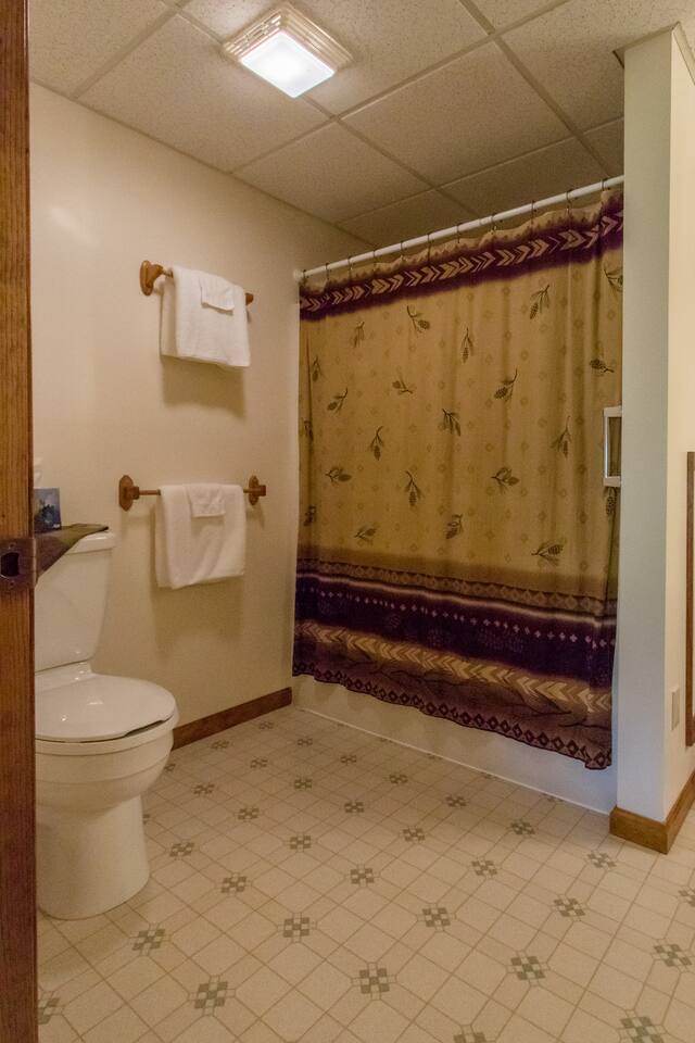 Full bathroom with a tub/shower combo. 