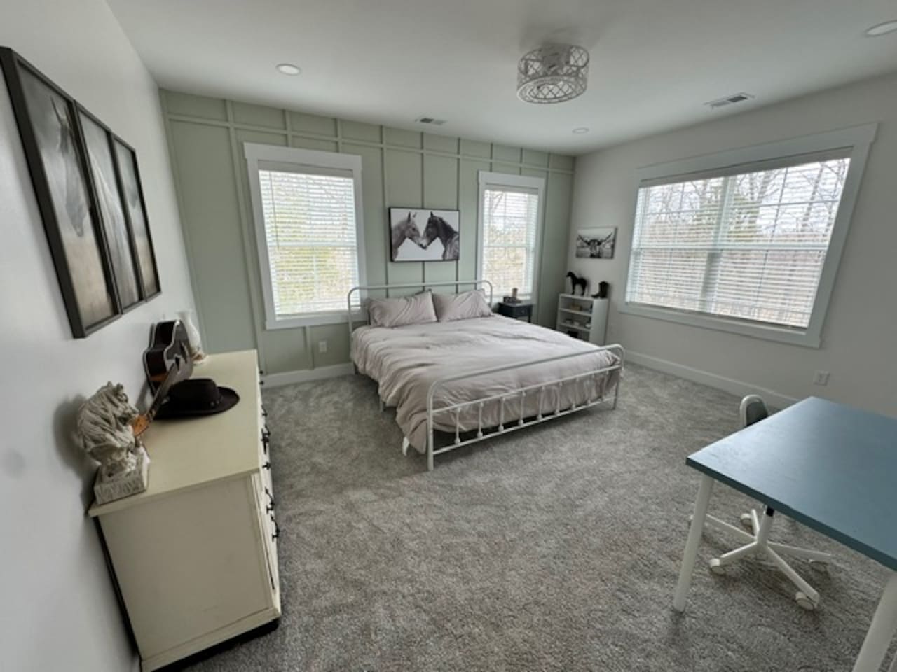 Welcome to Kentucky! This western-themed room is definitely a taste of the bluegrass. Private sink and makeup vanity with shared access to private toilet and shower with bedroom #4. Desk and chair available.