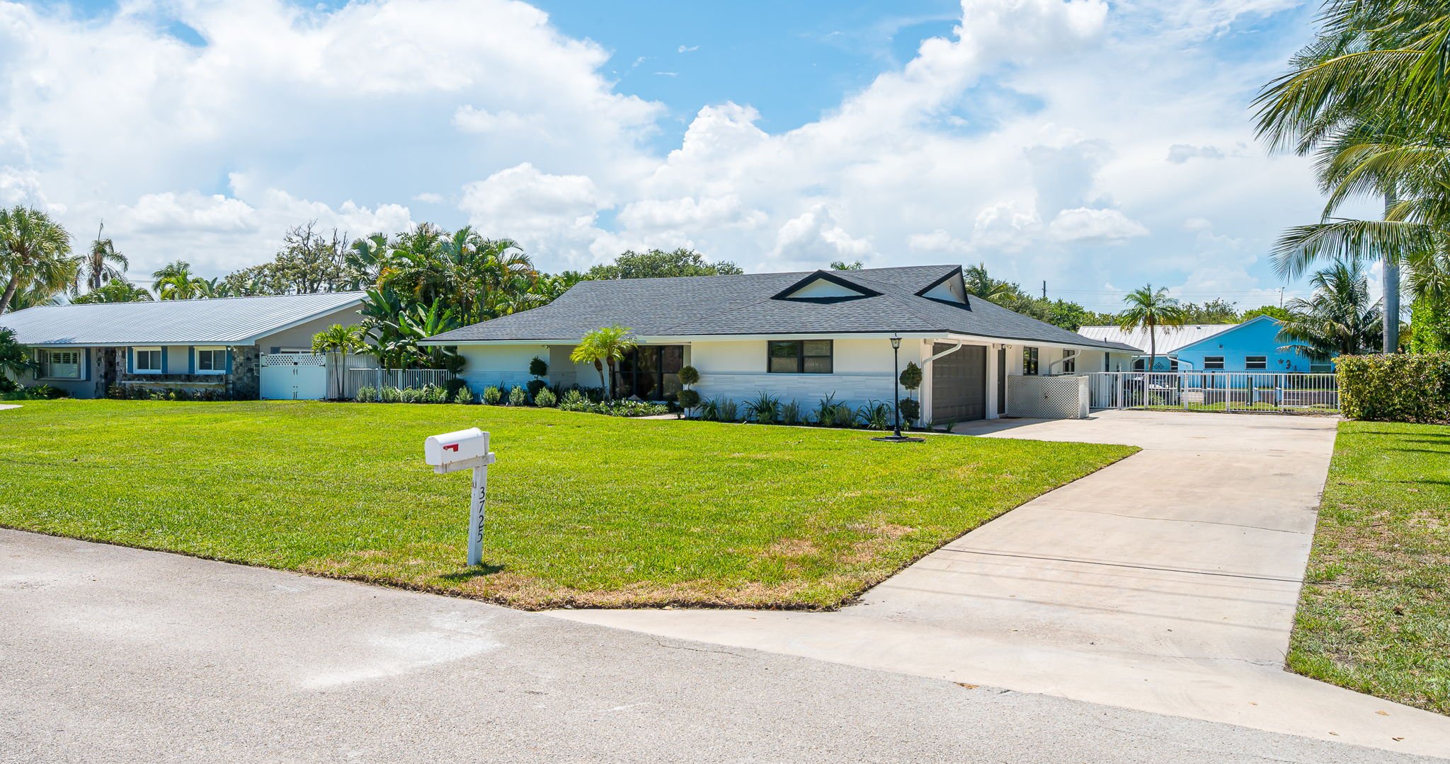 Welcome to this beautifully designed home with fresh landscaping and inviting curb appeal. The expansive driveway provides parking for up to three cars, making it ideal for families and groups. Located in a safe, family-friendly neighborhood