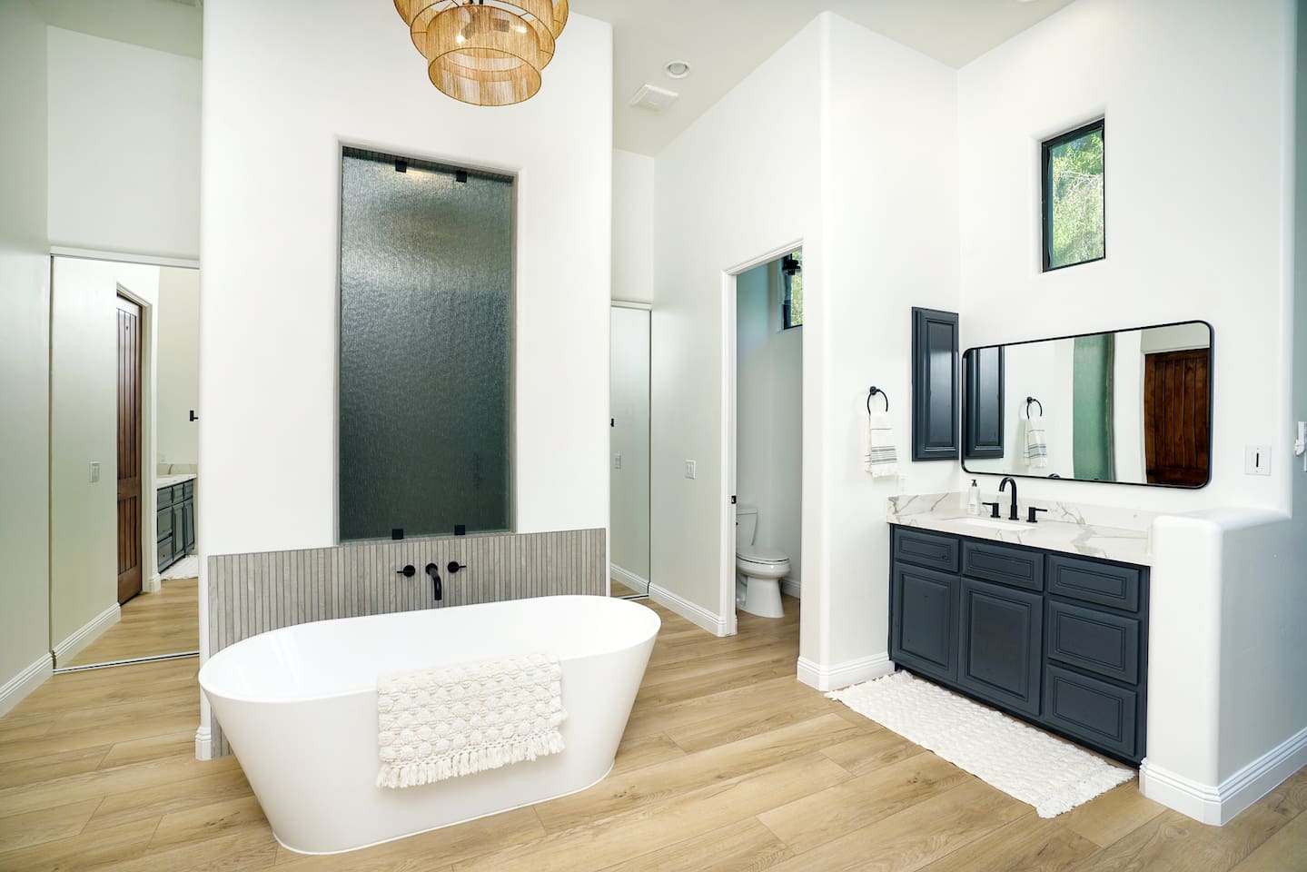 Owner's suite bathroom has a soaking tub and dual showers/dual sink stations, and even dual water closets!