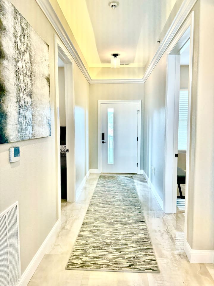 Wide hallways and well lit entry 