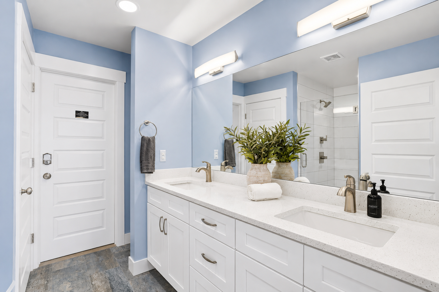 Refresh in your private spa-inspired en-suite, featuring a spacious double vanity, elegant finishes, and plenty of room for couples to get ready in comfort.