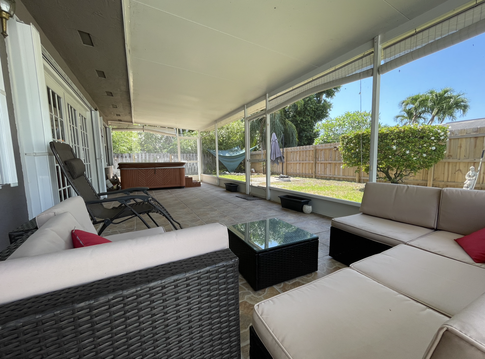 The sunroom is a great way to stay out of the heat while still enjoying all the green space.
