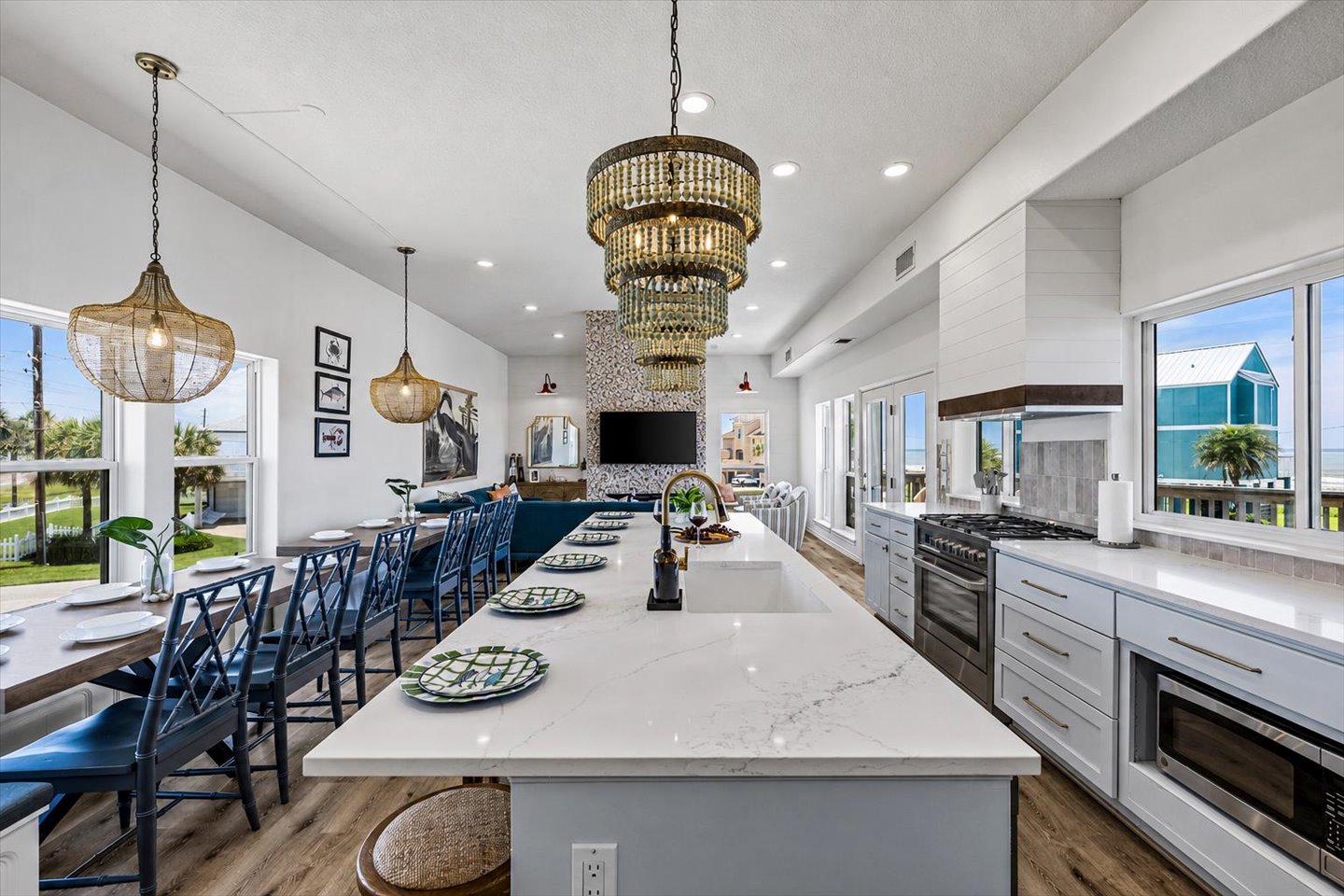 Massive kitchen has large island for 6 seats, large sink, dishwasher, built in ice maker, 6 burner gas stove and oven.  All this makes meal prep a breeze! 