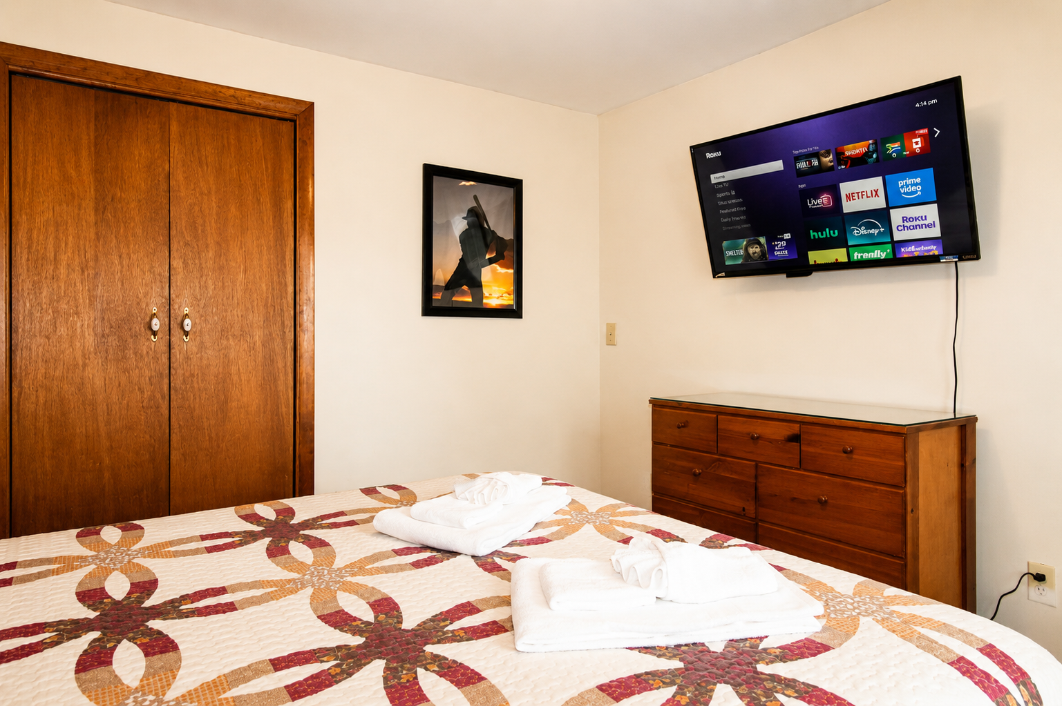 40" or larger smart flat screen Roku TV in the bedroom.