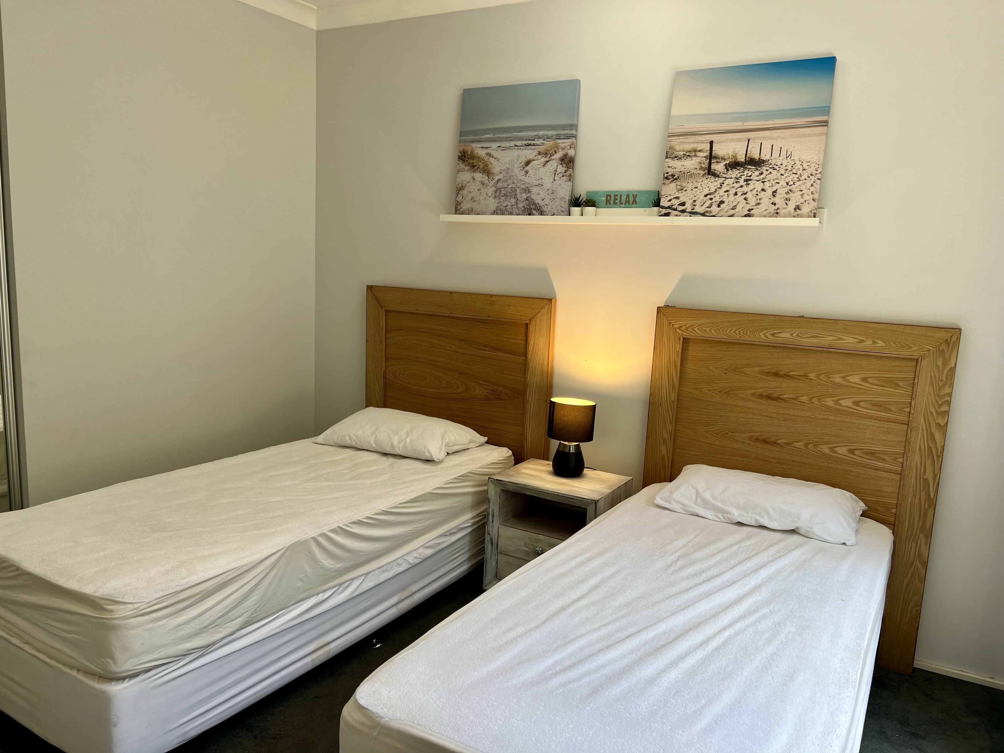Bedroom Three with 2 single beds & built-in robe