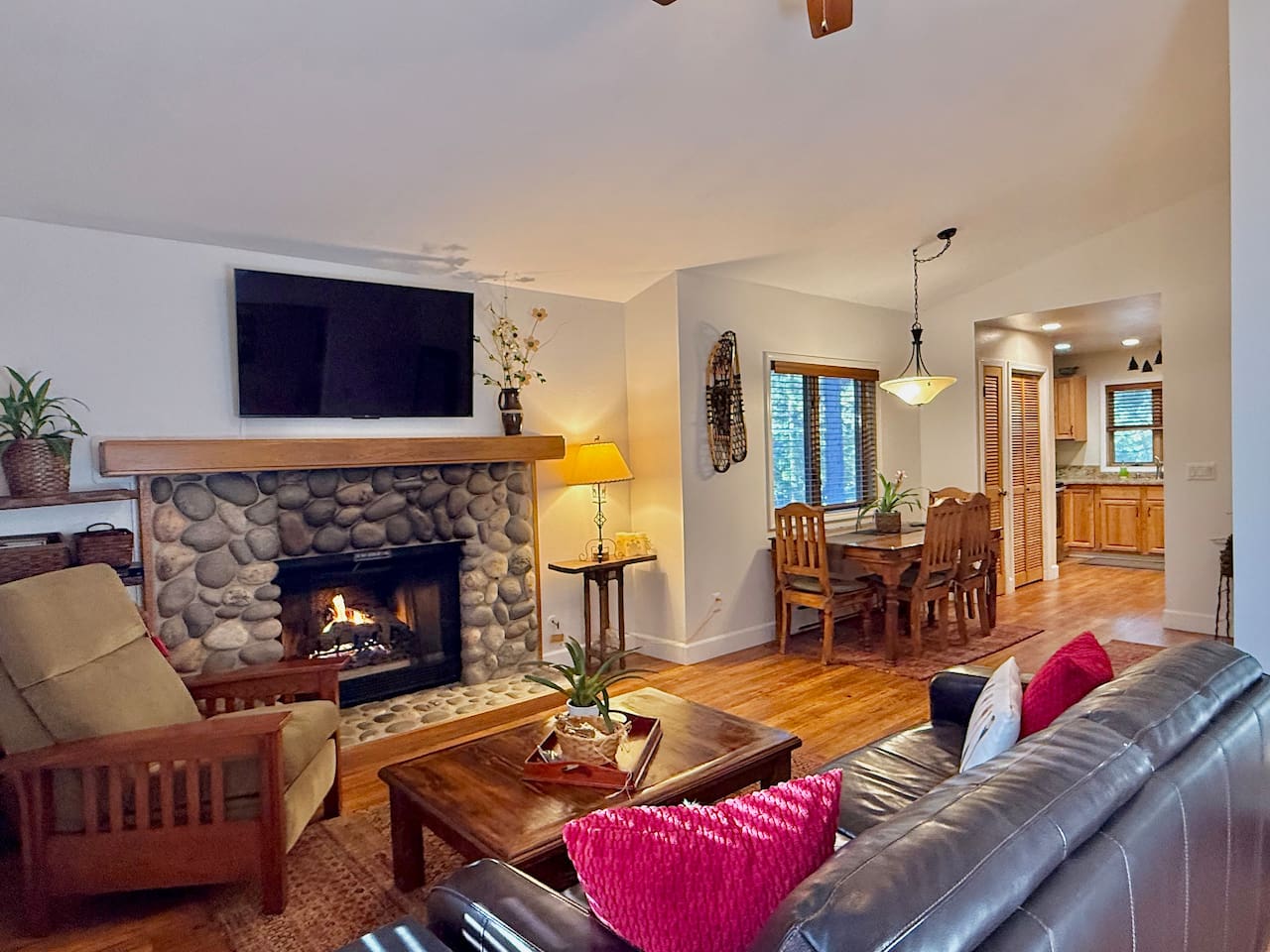 Relax and enjoy the glow of the fireplace, a 4K HDR viewing experience, and the comfort of a leather sofa with a premium memory foam sleeper.
