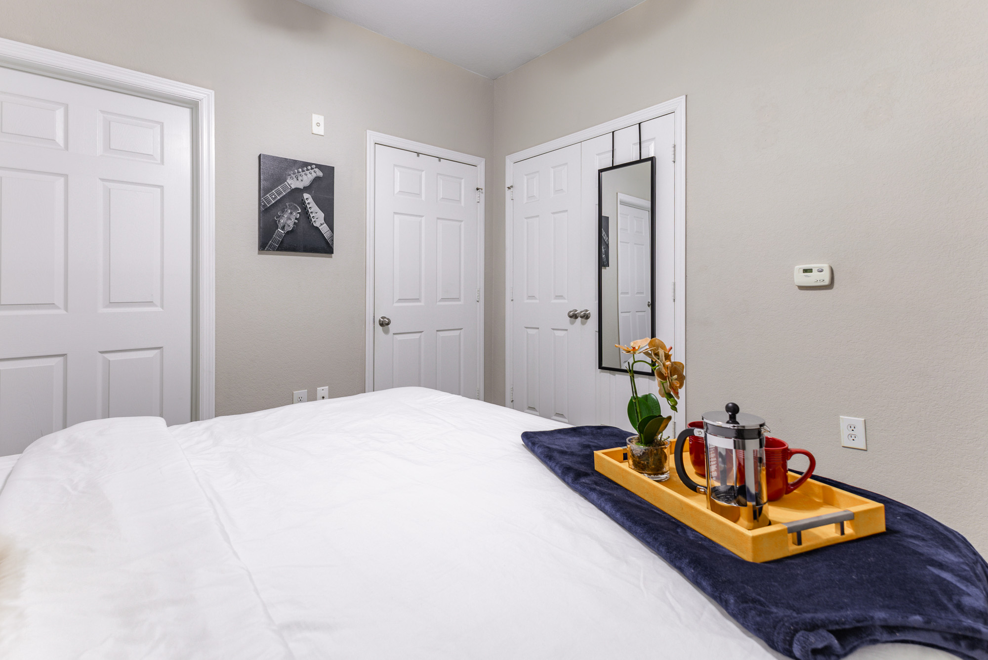 bedroom with closet and bathroom