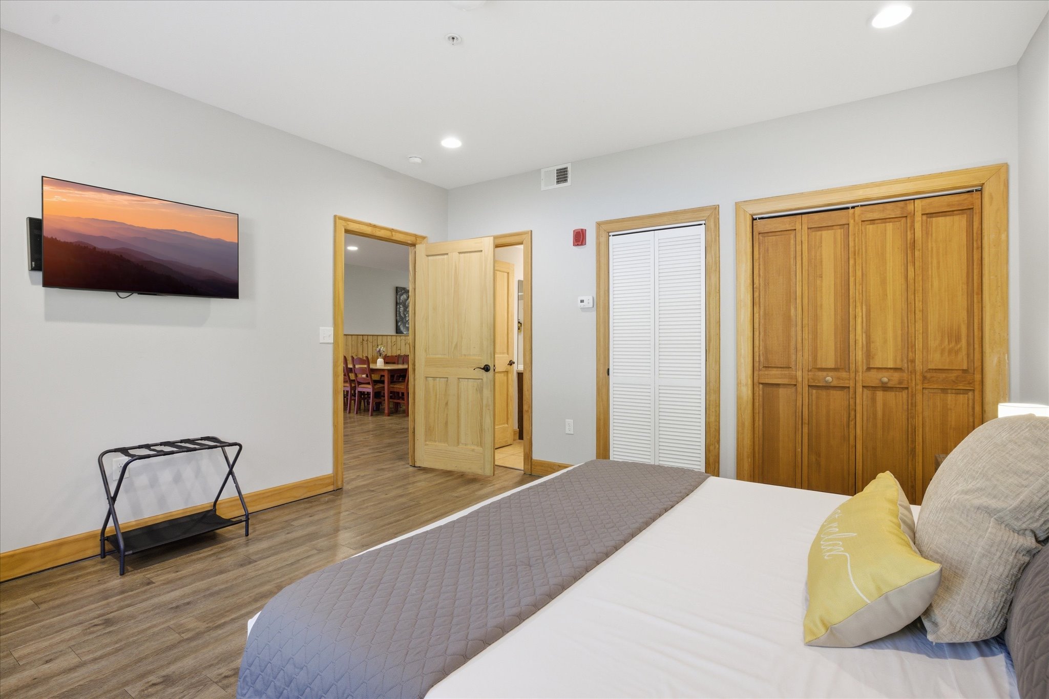 From this angle, the king suite feels even more inviting, offering a quiet retreat to sit back and catch up on your favorite shows with soft tones and a layout that makes it easy to relax at your own pace.