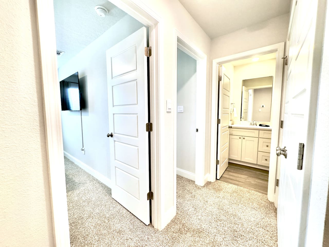 bedroom to one side, bathroom right there to the other. Easy, close together, effortless to move between.