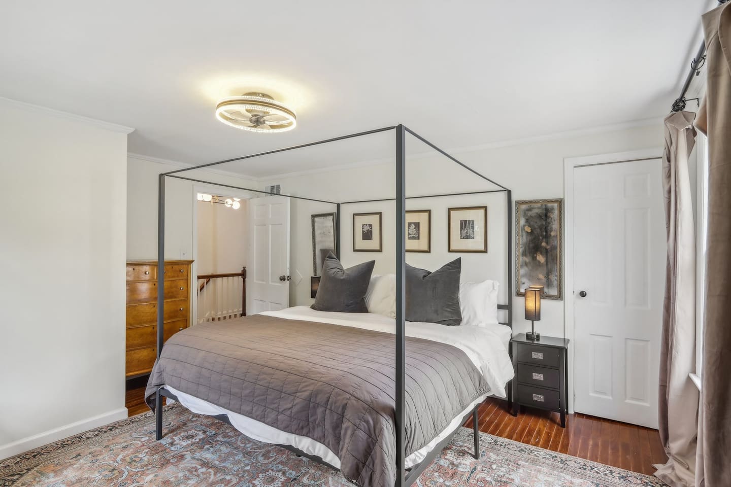Unwind in the primary suite with a luxurious king-size bed, soft sheets, and cozy bedding designed for a restful stay.