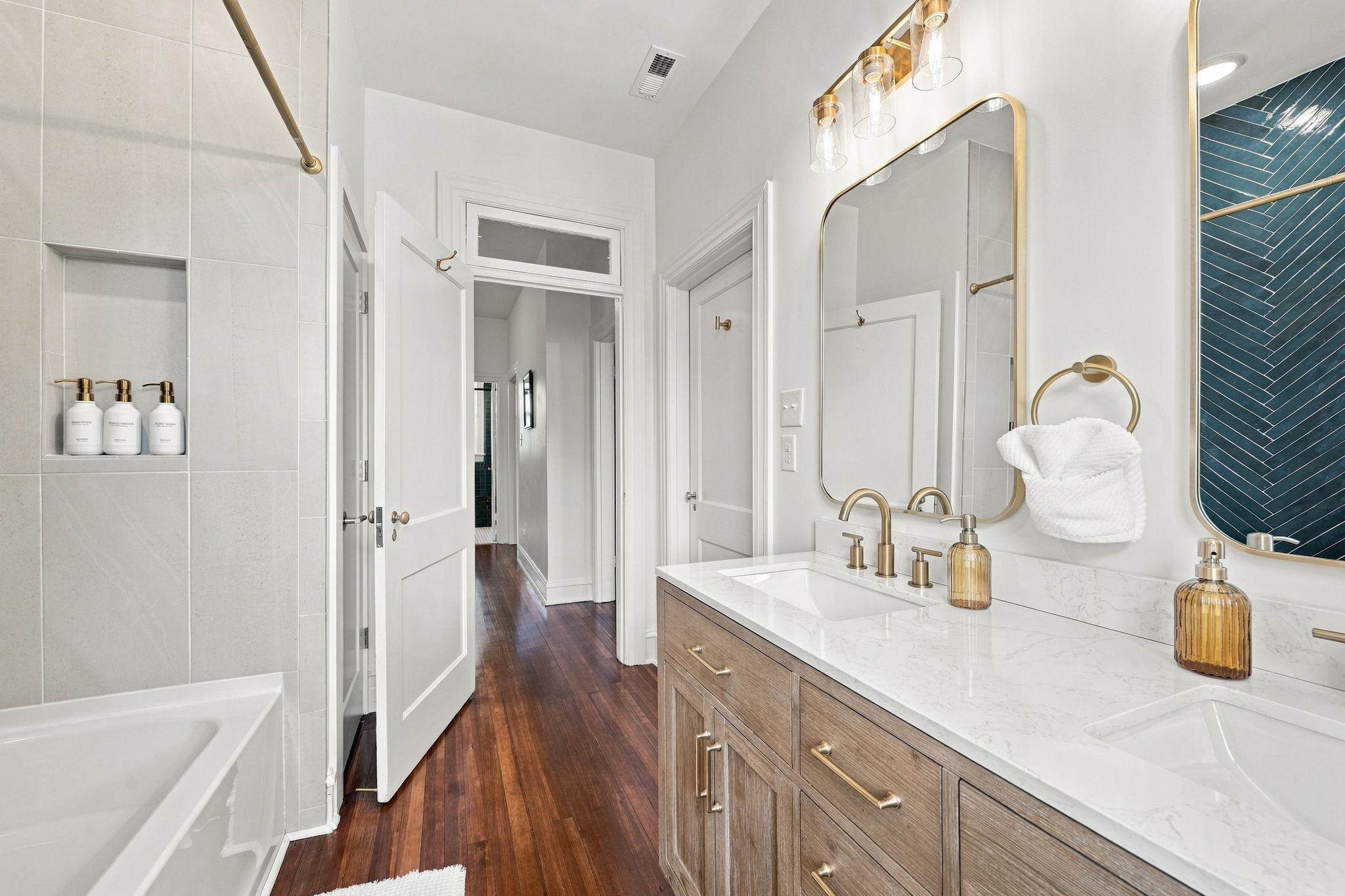 Luxurious Bathroom: Dual sinks and elegant accents create a serene retreat for relaxation!