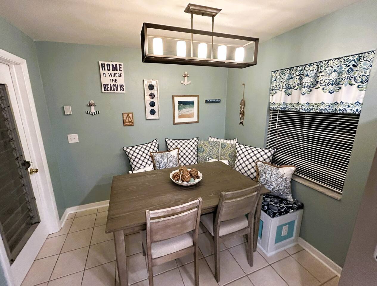 Breakfast Nook/Work Station/Multi-use space. Sit on the comfortable, padded bench or chairs and enjoy a cup of coffee while catching up on emails or other work. USB Plugs located on both sides of bench to charge laptops, phones, tablets etc.