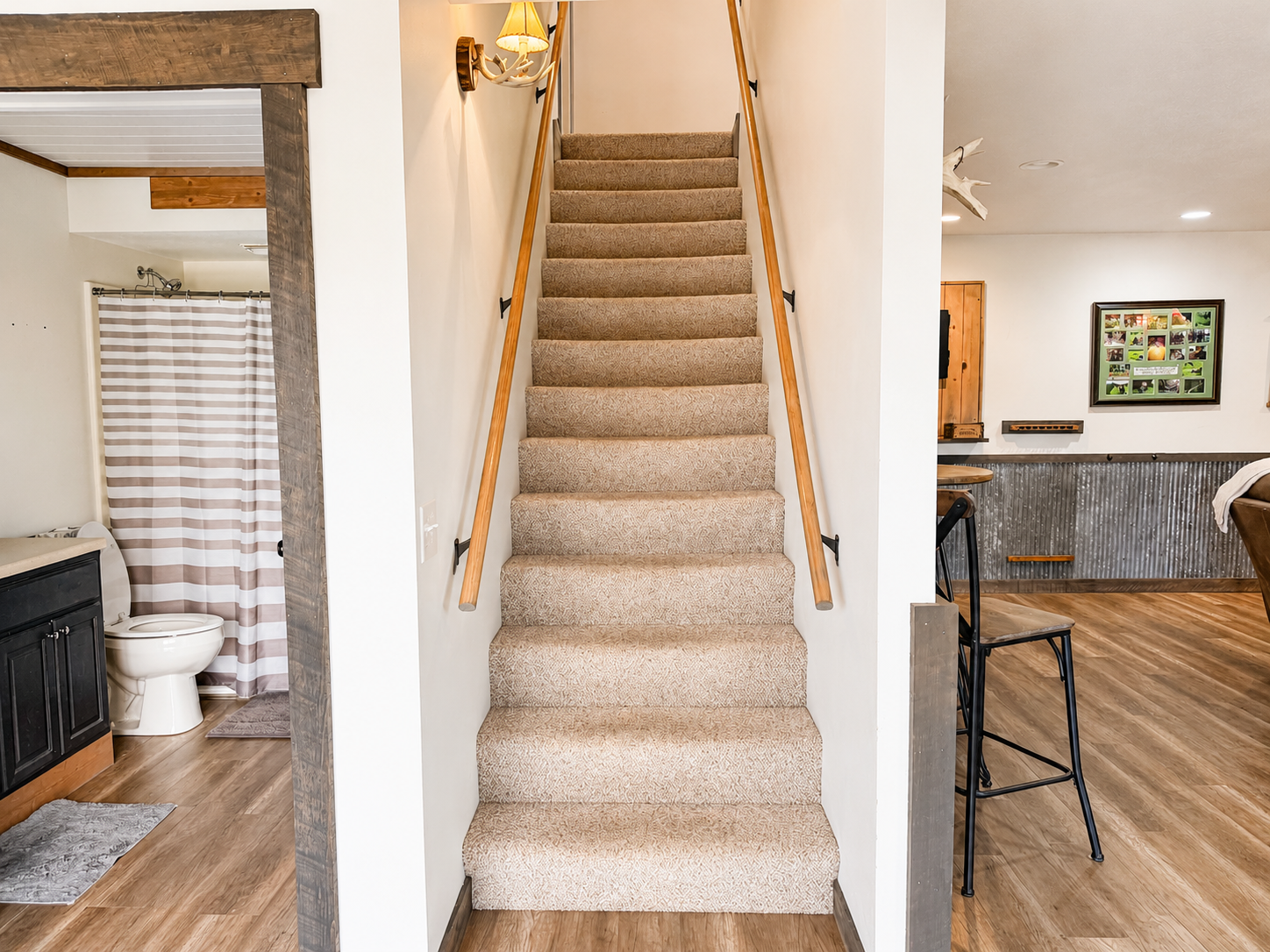 Interior staircase connects the lodge living and sleeping spaces, helping larger groups easily spread out throughout the property while still staying together under one roof.