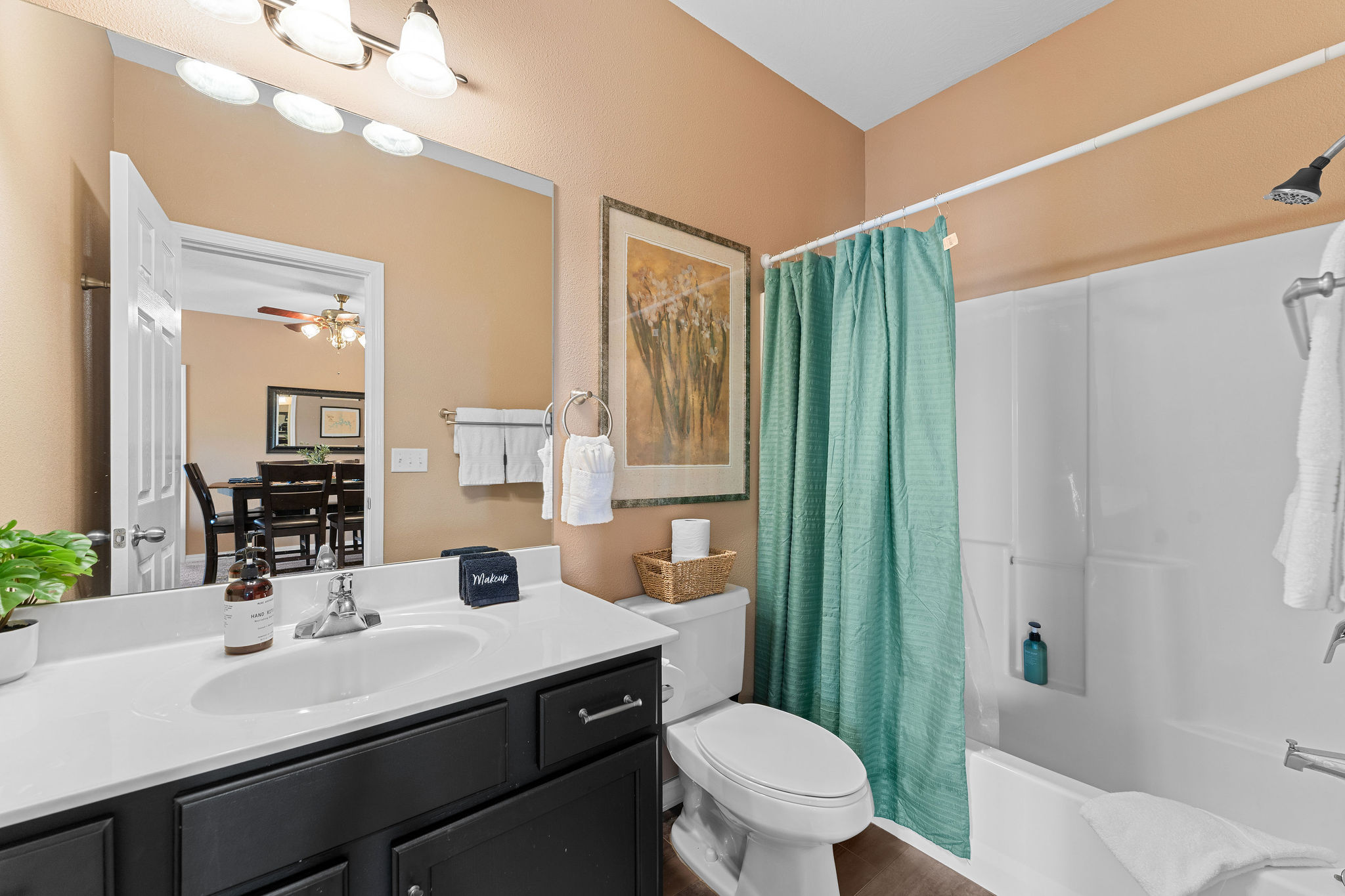 The shared second bathroom has a tub and a shower