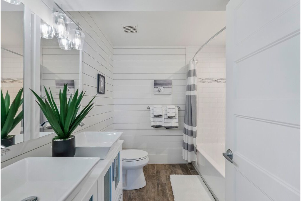 Full bathroom with shower and tub combo