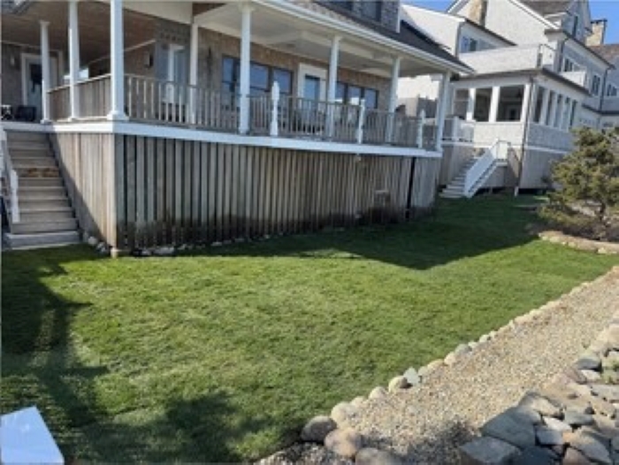 Relax on the deck with sweeping ocean views—your serene coastal escape.