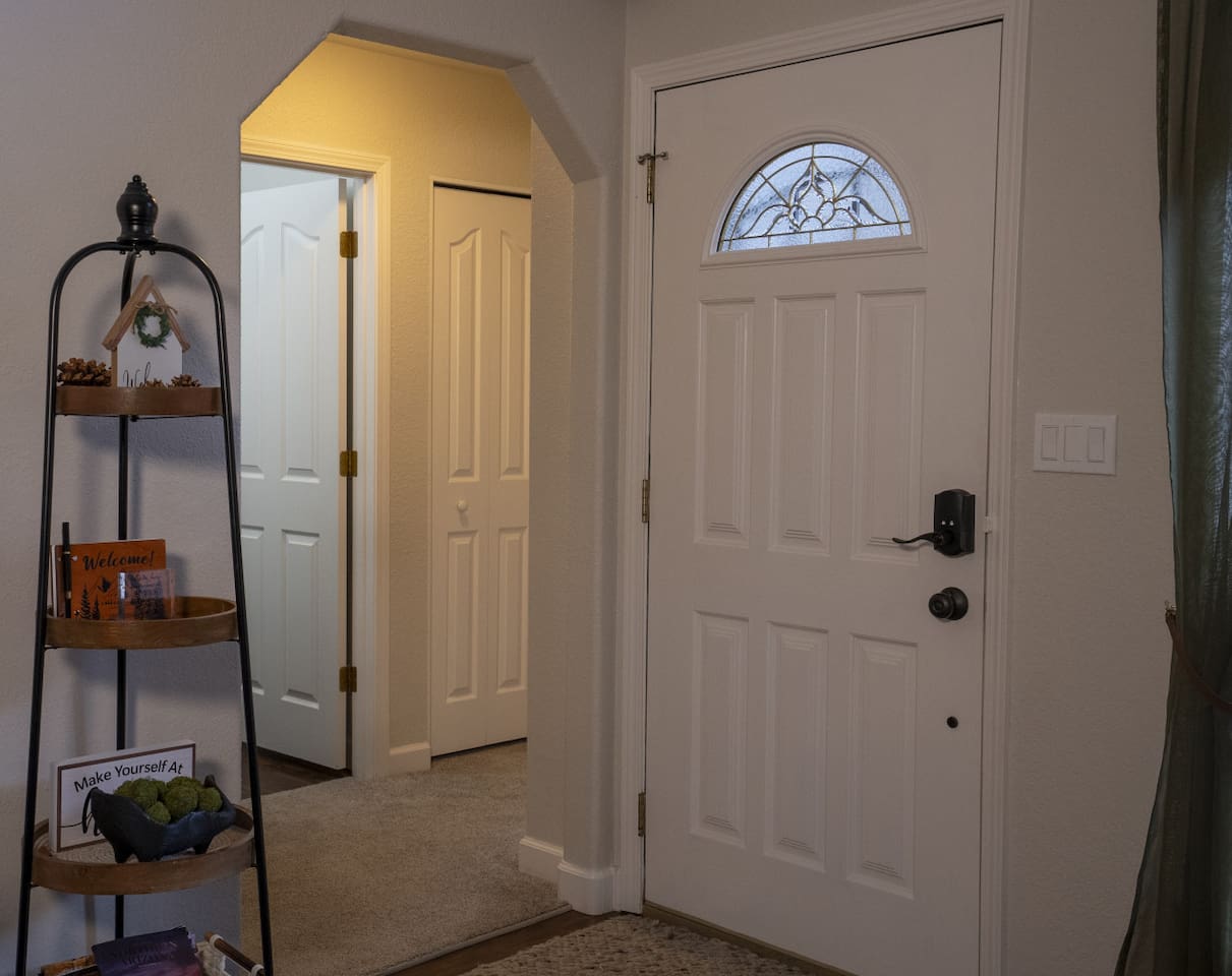 Hallway view showing the bedroom access from entry way