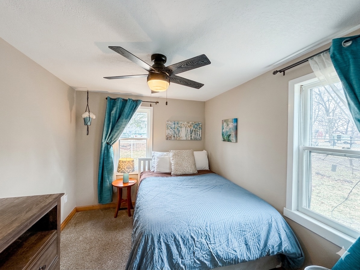 The queen bedroom offers a comfortable pillow-top mattress.