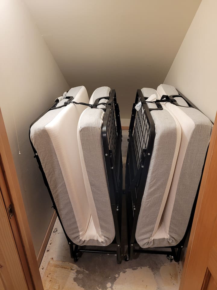 Two twin fold out cots available in the basement rec room.