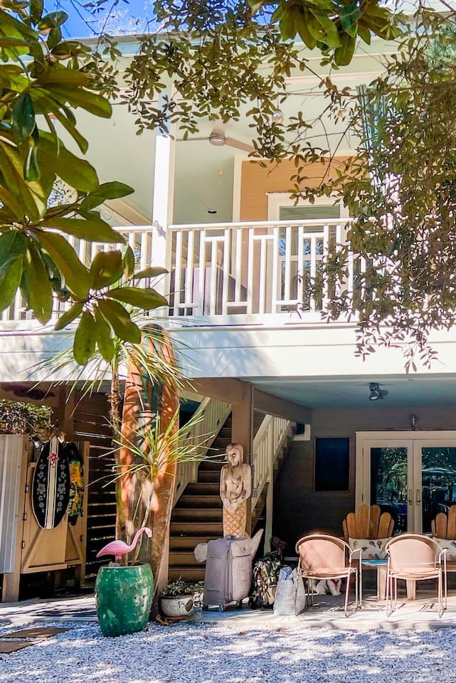 Outdoor steps lead to elevated main living spaces!