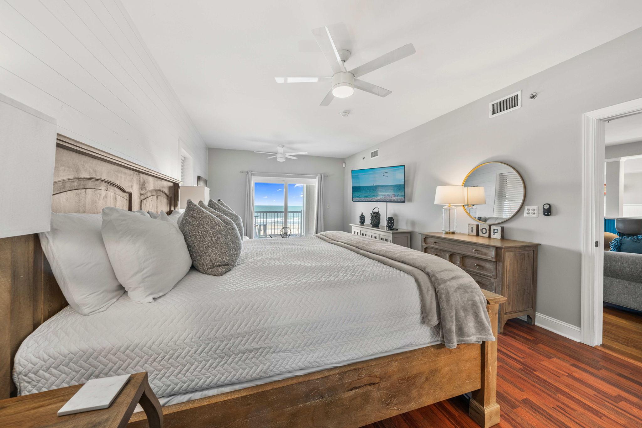 Bedroom 1: Primary King Suite  | Morning Sunrise | 302 Oceanview | 1116 Ocean Blvd, Isle of Palms, SC | IOP Escapes