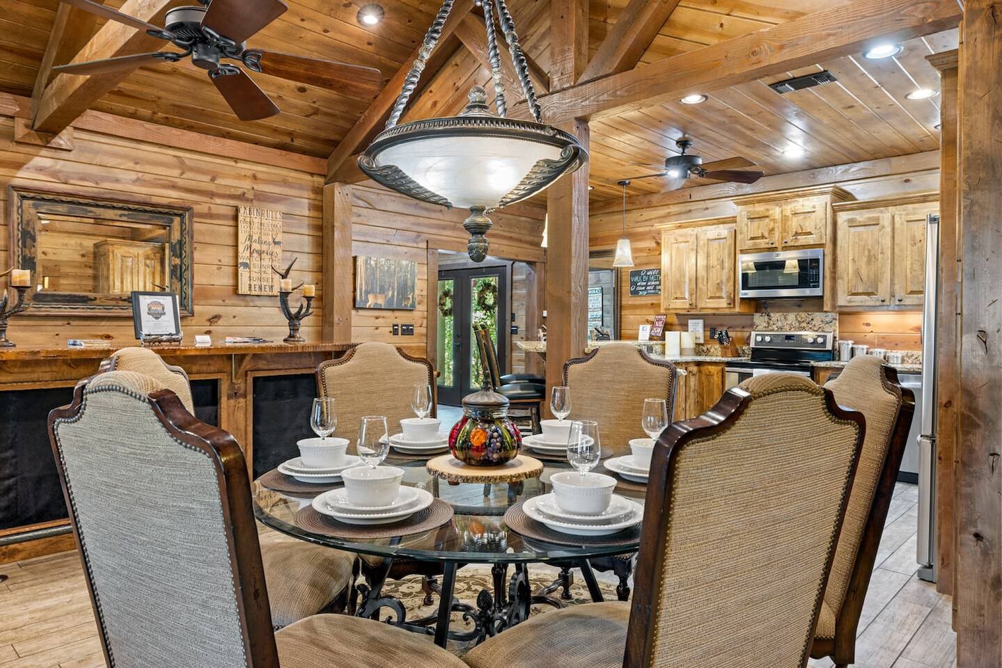 Share stories and meals at a table built for six, just steps from the cozy fireplace.