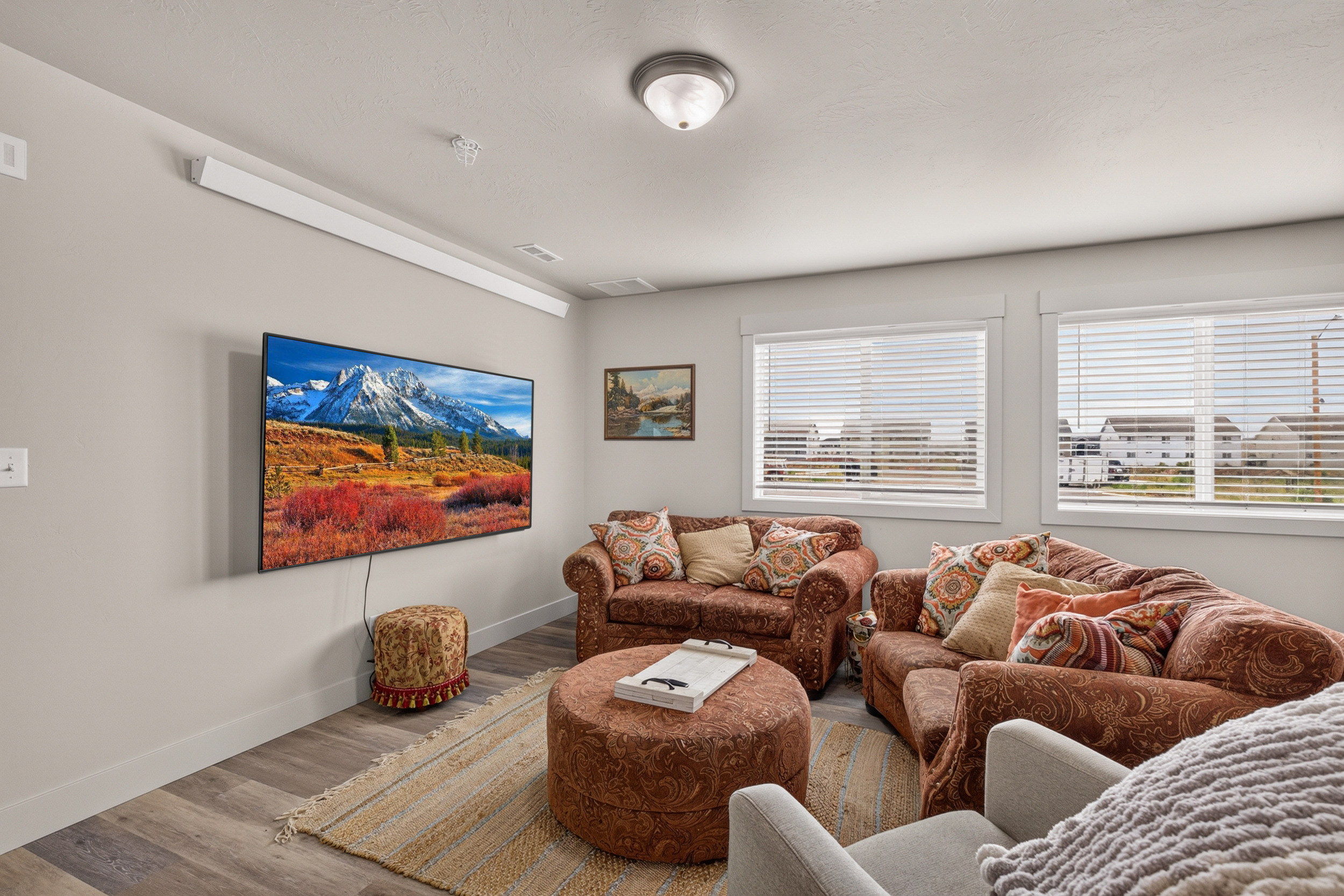 Living room with large mounted TV.