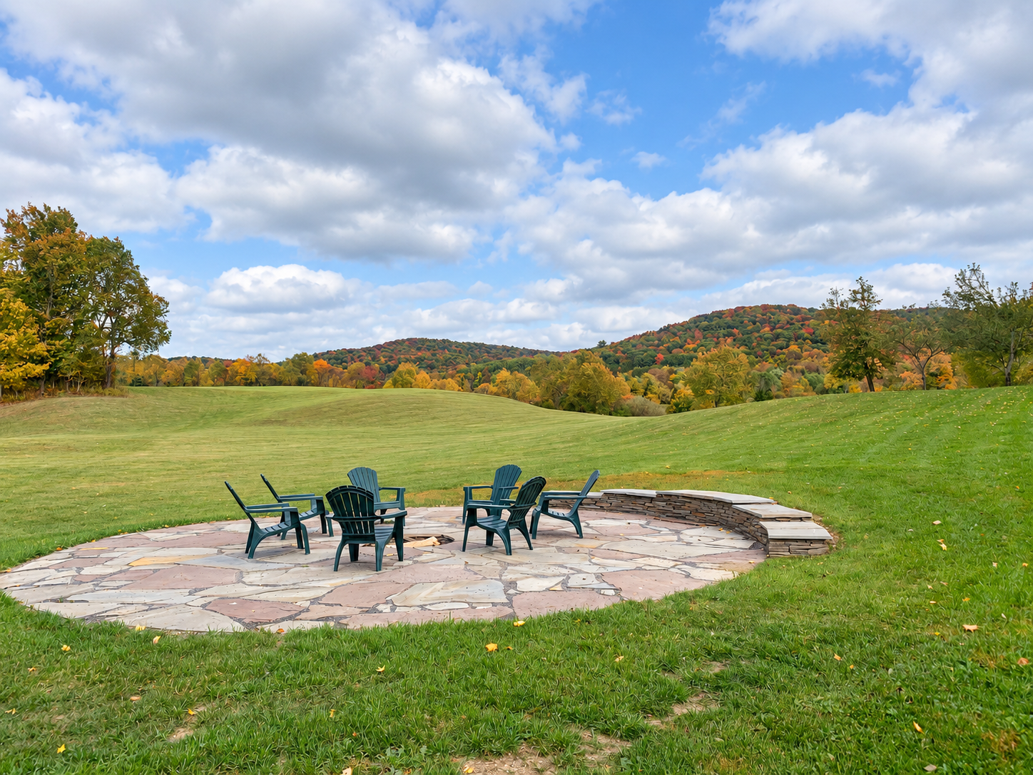Unwind around the shared fire pit with peaceful views of the surrounding hills.