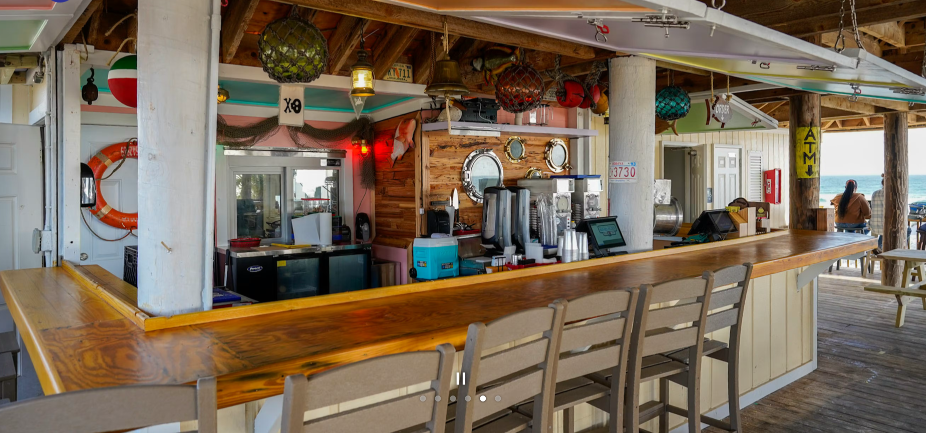 Sand Flea Beach Bar & Resturant.

https://www.sandfleadestin.com
