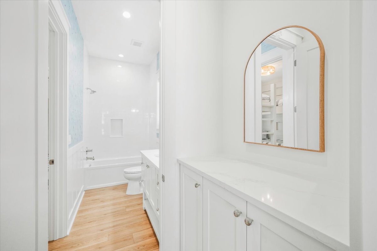 This bathroom is shared between the bunk room and the bedroom with two full beds.
