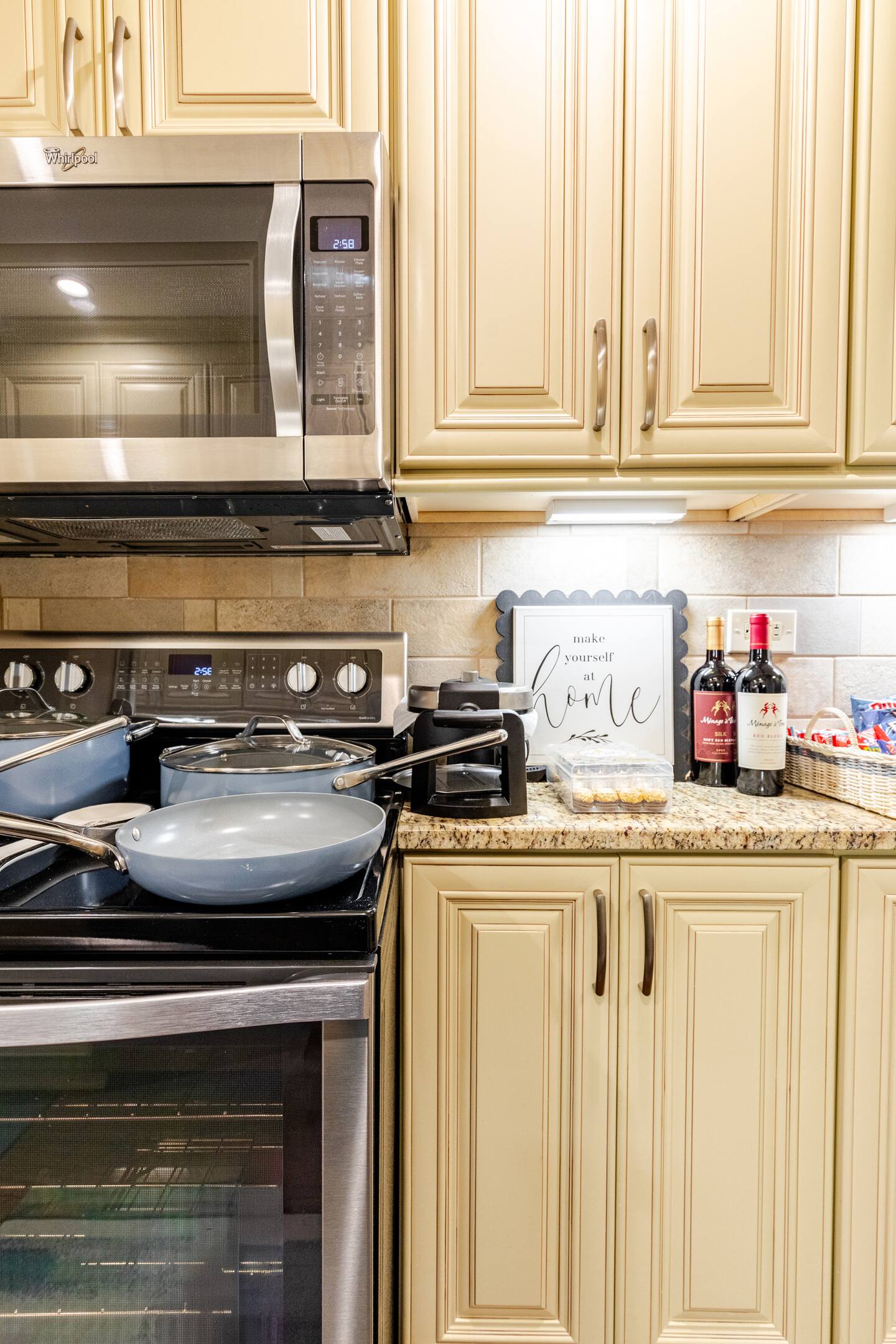 Sleek kitchen w/ modern cabinets & ample counter space for easy meals.