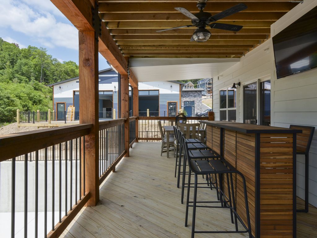 Deck space with outdoor dining and bar