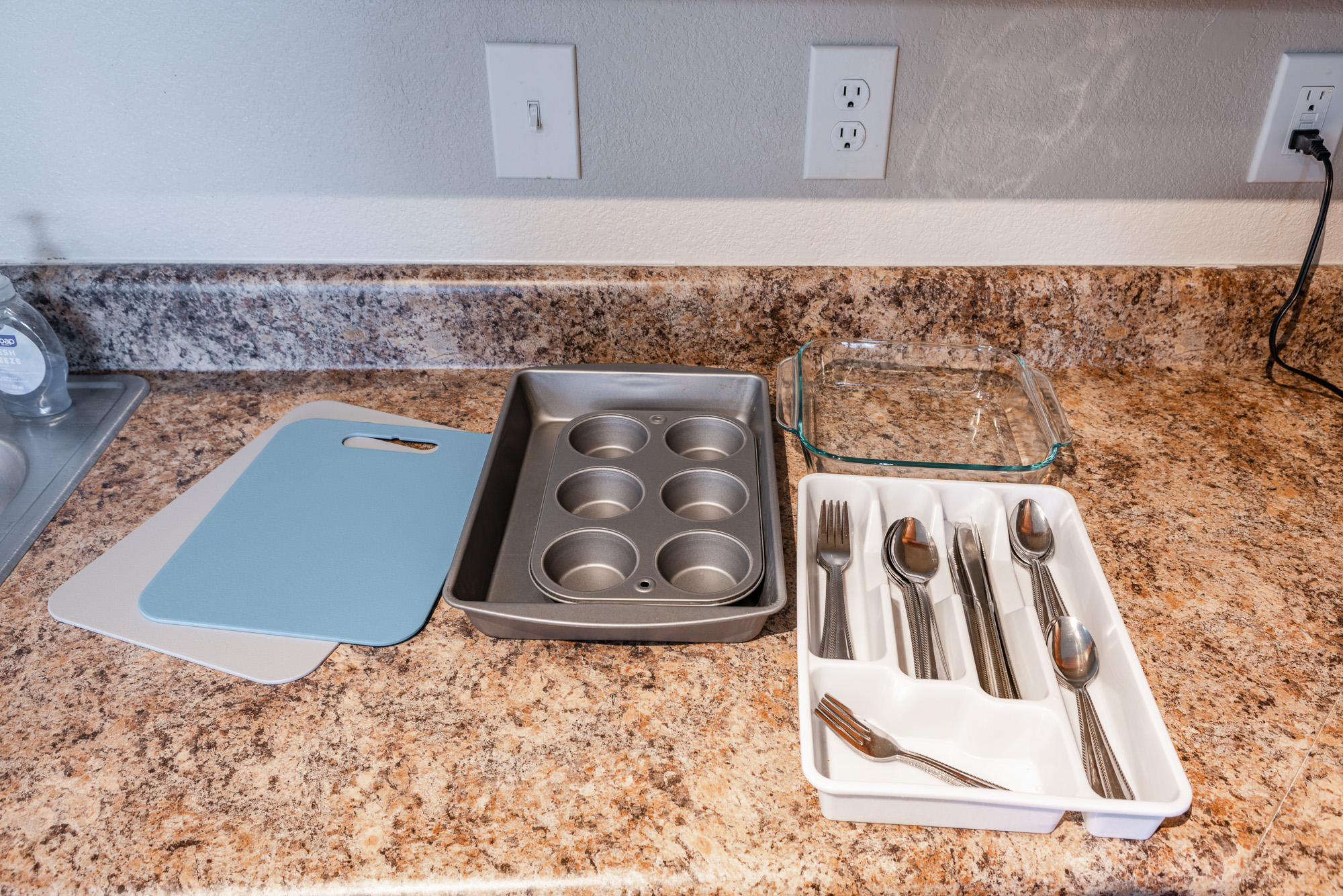 silverware, baking and cutting boards