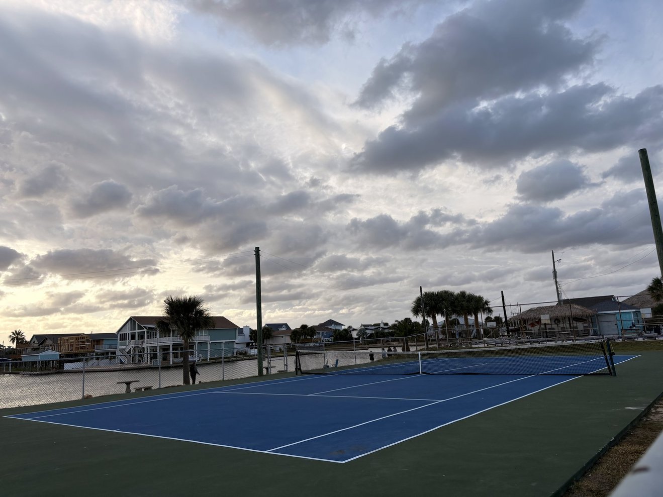 Tennis and pickleball courts available for your use just a walk or golf cart ride away.