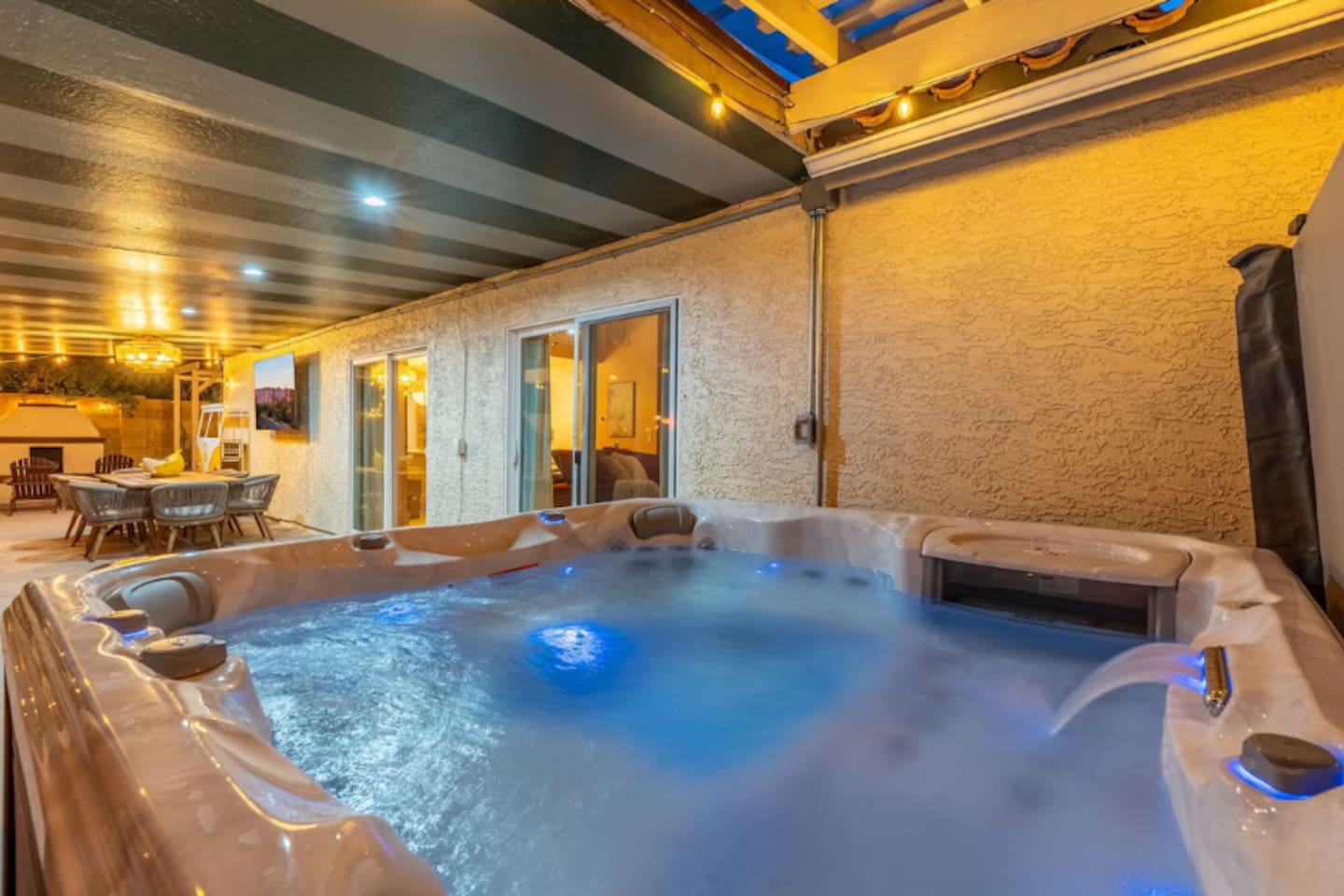 The custom lights and the sound of the waterfall of the hot tub are sure to take the stress away.