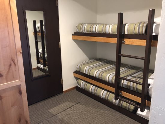 bedroom: Twin bunkbeds, 1 twin bed. (3 twin beds total)