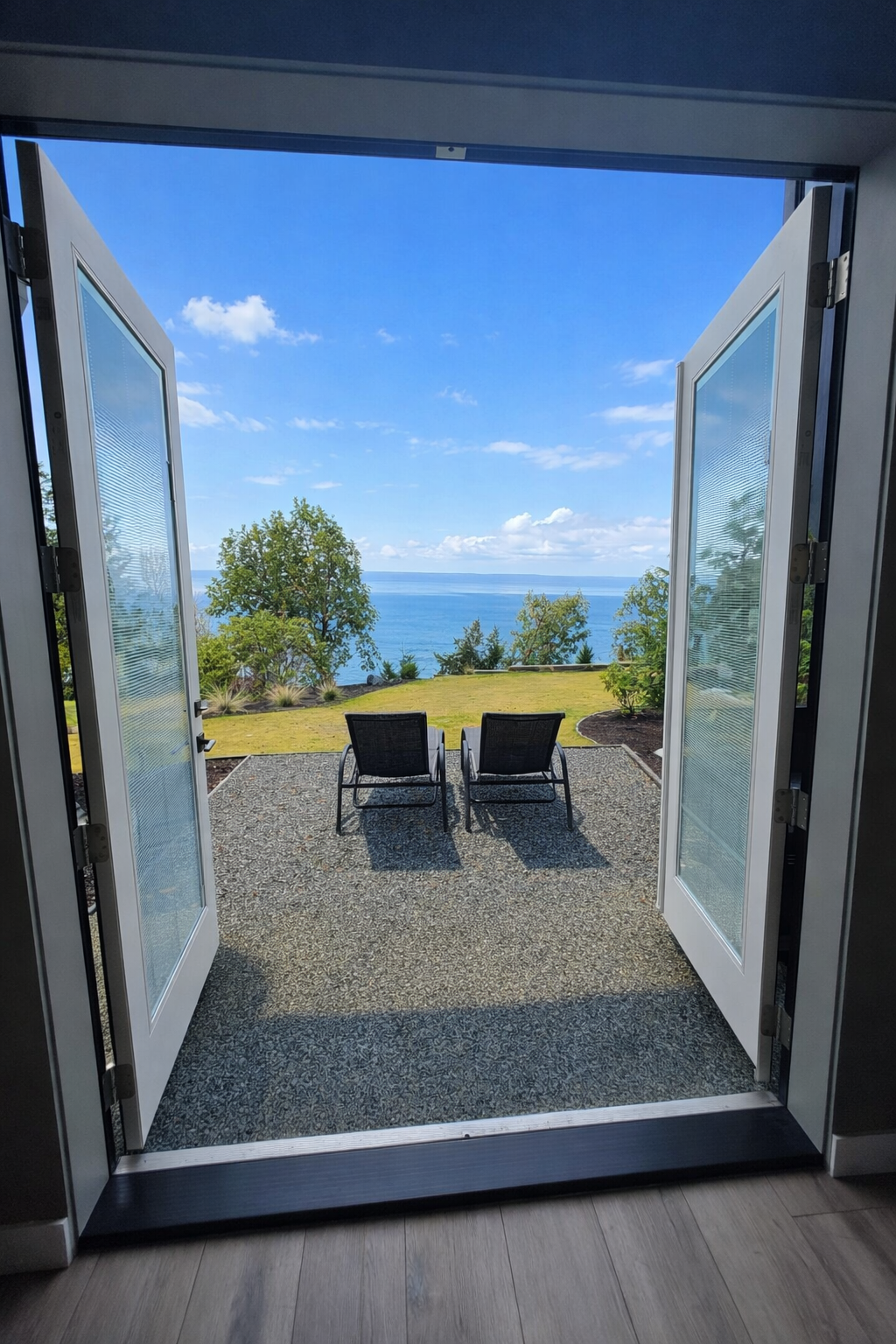Step outside thru double glass doors and lounge away. Please enjoy the views and the ocean air.