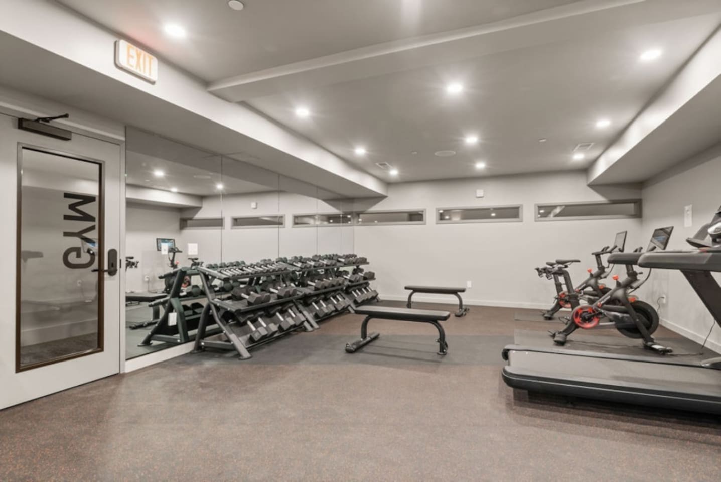 Building gym facilities. This is public space and guests are encouraged to use, during their stay. 
This facility has all you need to keep your workouts going string while travelling.