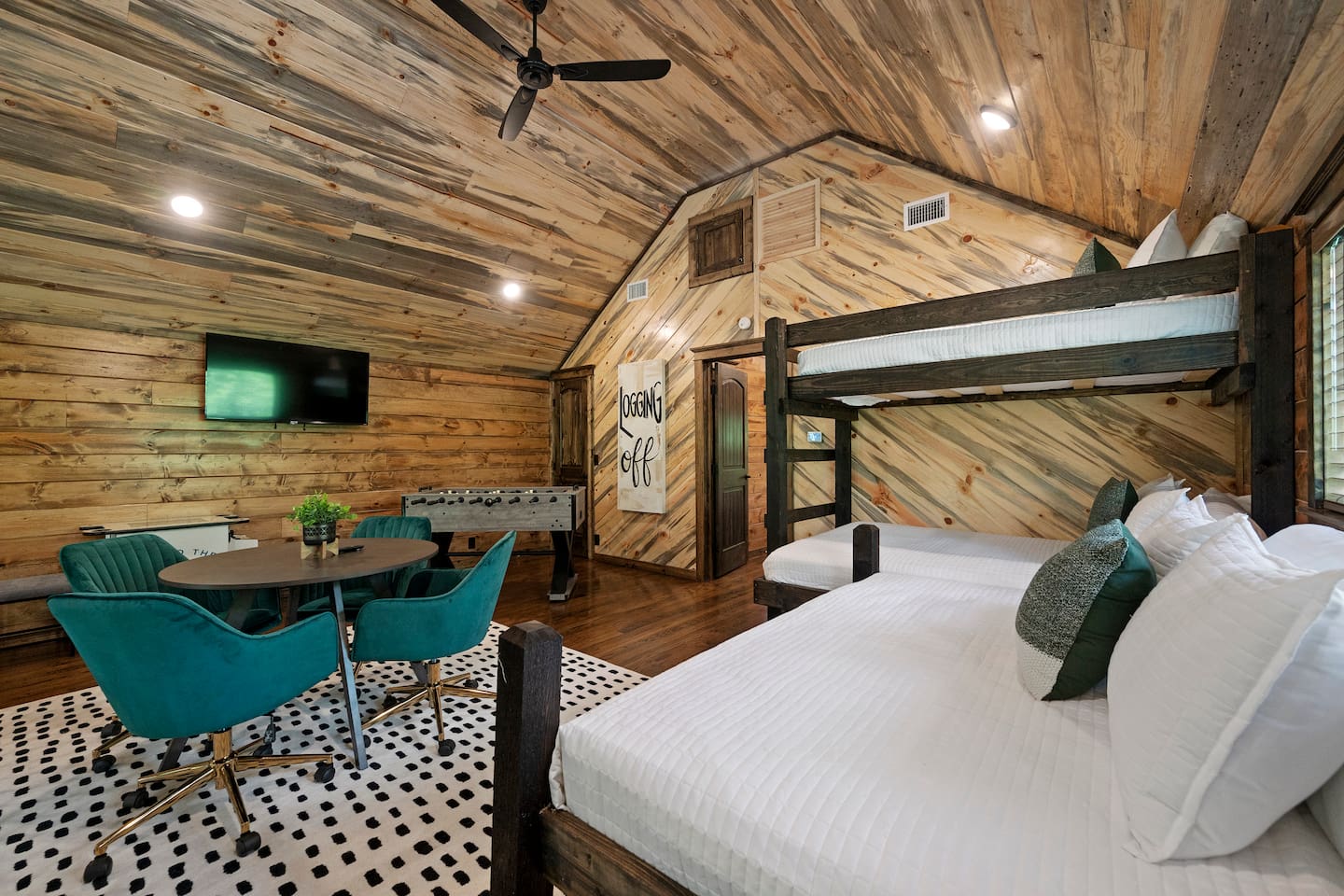 Loft area with twin-over-full and full-over-twin trundle beds—perfect for kids and teens to bunk together.