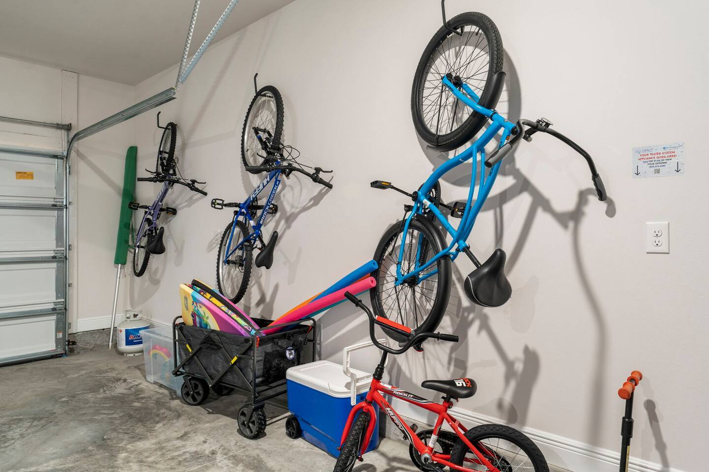 Spacious garage with bike for adults and kids