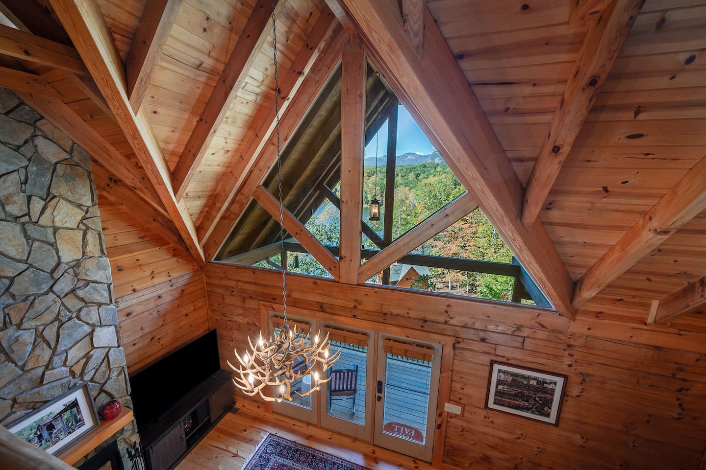 Looking down from loft with mountain and lake view