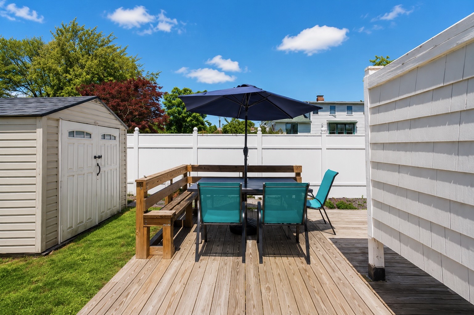 Backyard patio perfect for gathering with family and enjoying the fresh ocean air.