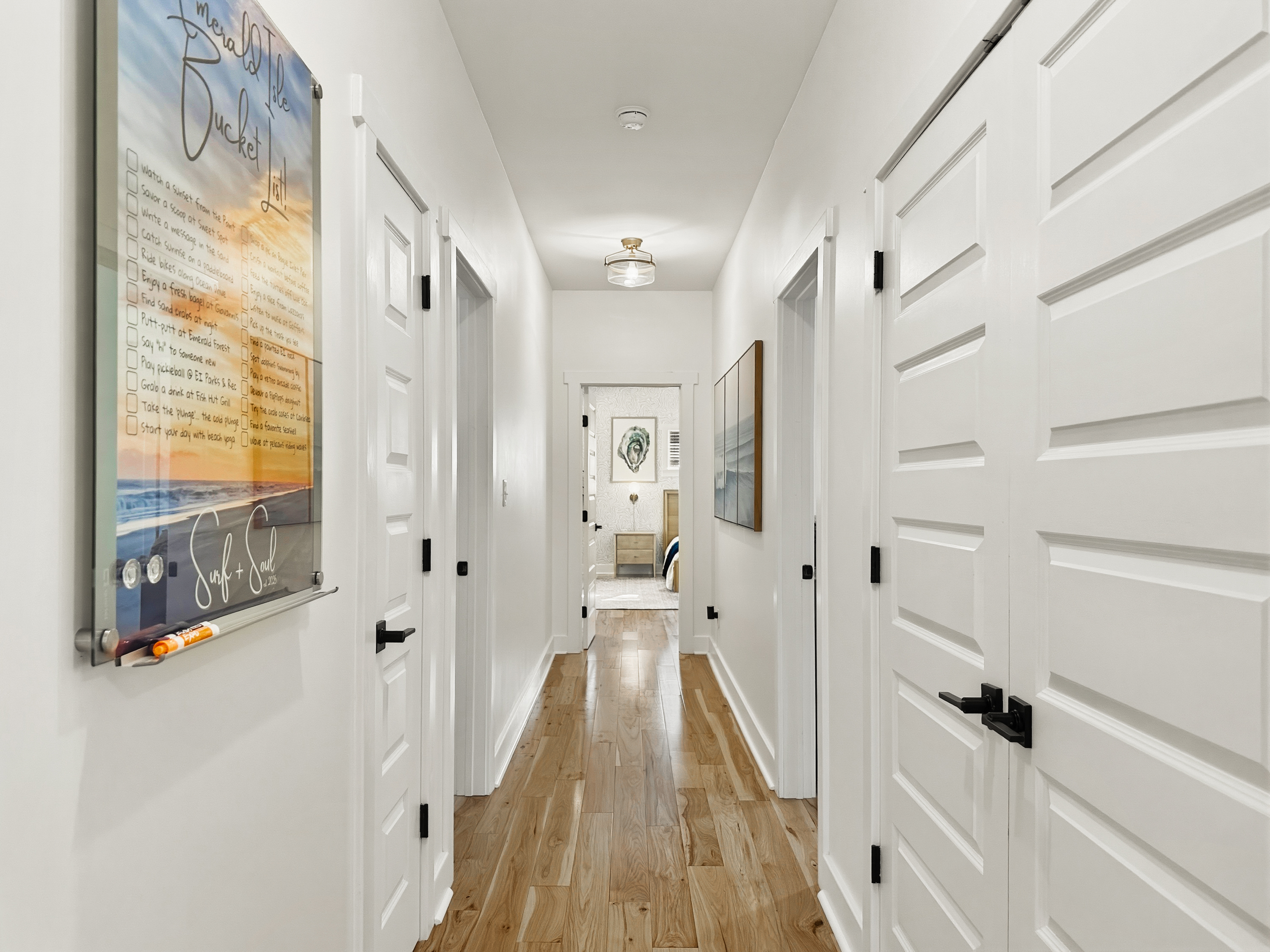 The hallway leads you to the 3 upstairs bedrooms.