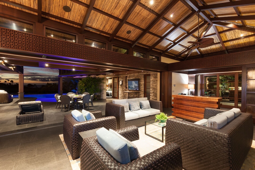 Great Room leading to outdoor lanai and the office to the right.