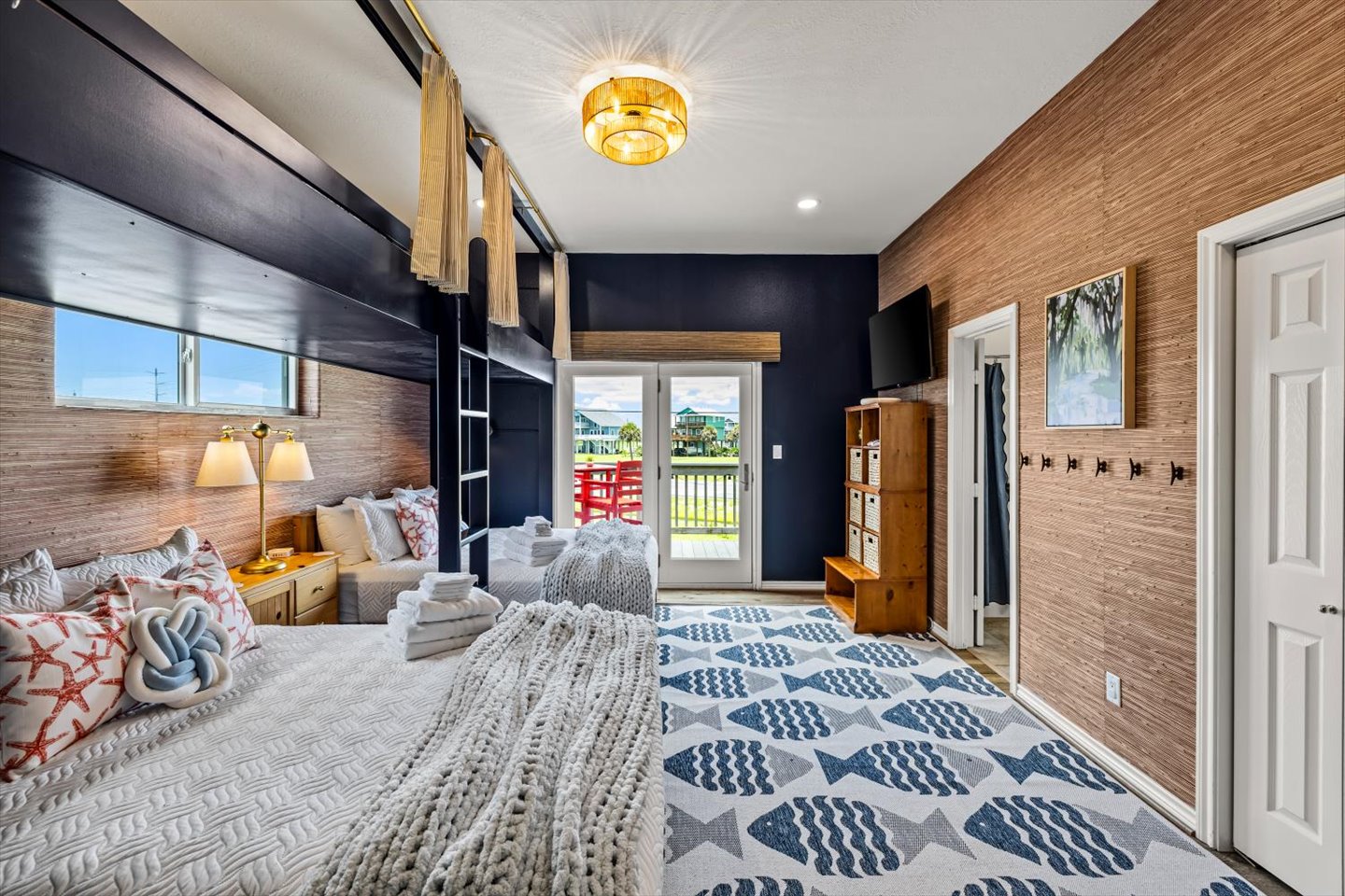 The Fishing Pier has access to the Hollywood Bath shared with the Crab Shack. Enjoy your morning coffee on the Deck, right outside the door. Shades are remote control and black out too! 