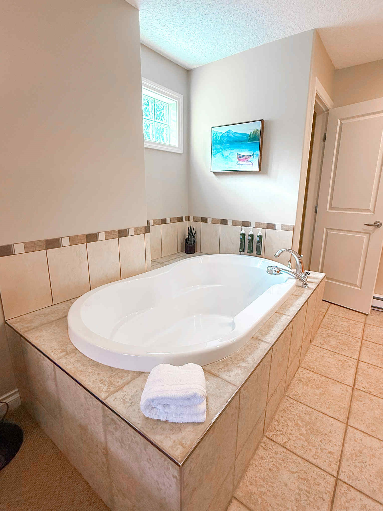 Unit A Soaker tub right in primary suite.